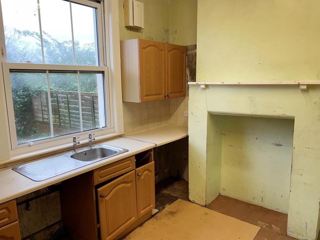 Lot: 109 - HOUSE IN NEED OF REFURBISHMENT AND REPAIR - Kitchen to rear with view over patio